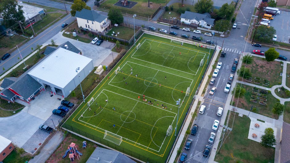 Aerial shot of a vibrant soccer field in Chattanooga, TN with active players.