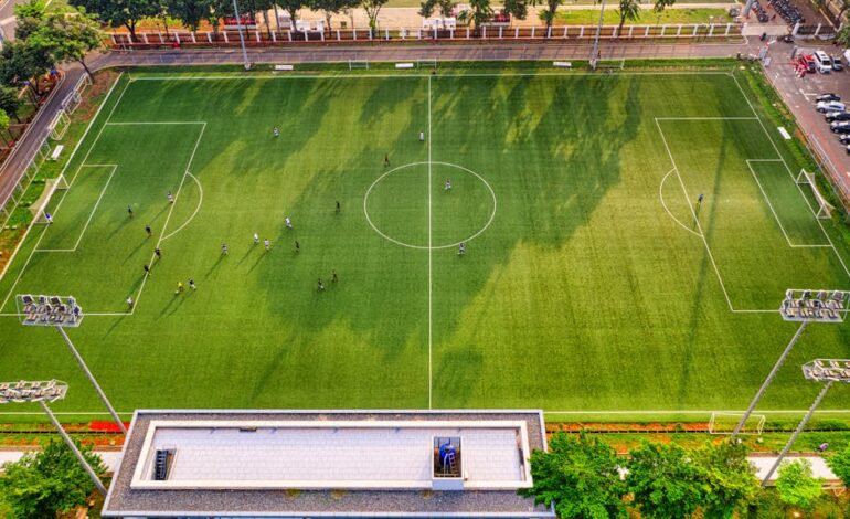 High-angle shot of a soccer game at a stadium in Jakarta, Indonesia.