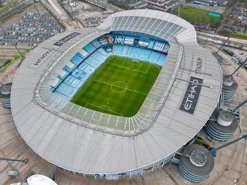 A stunning aerial view of the iconic Etihad Stadium in Manchester, UK.