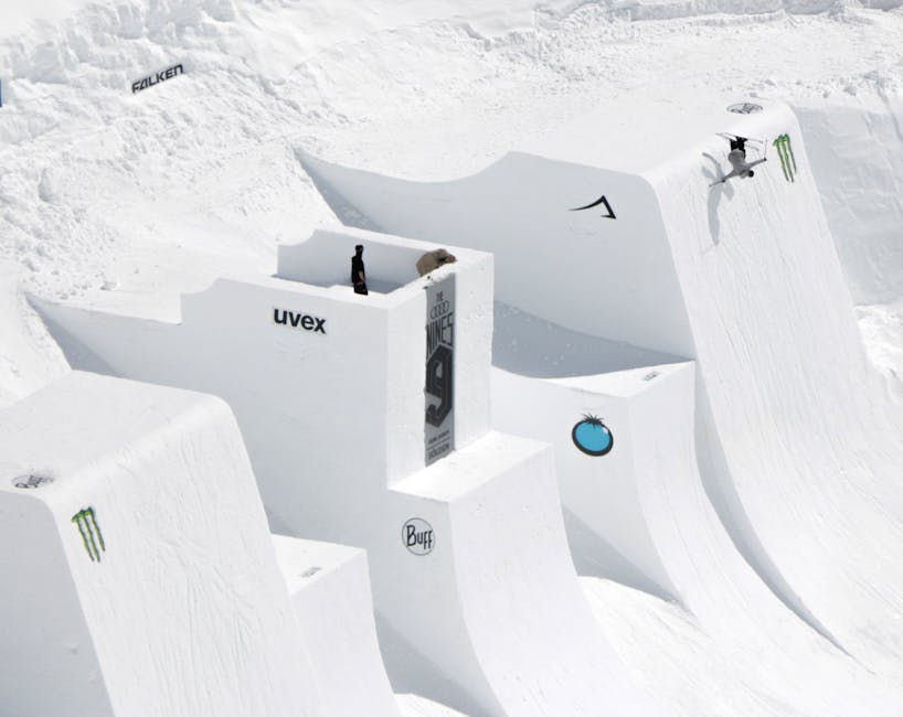 High-flying snowboarder performing a trick at the Sölden Snow Park in Austria.