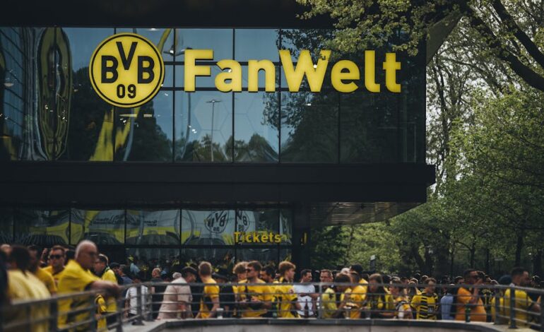 Fans gather at Dortmund's Fanwelt outside Signal Iduna Park on match day.
