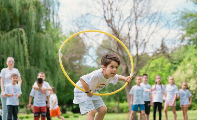 Kids enjoying a summer day playing with hula hoops in a park, showcasing friendship and fun.