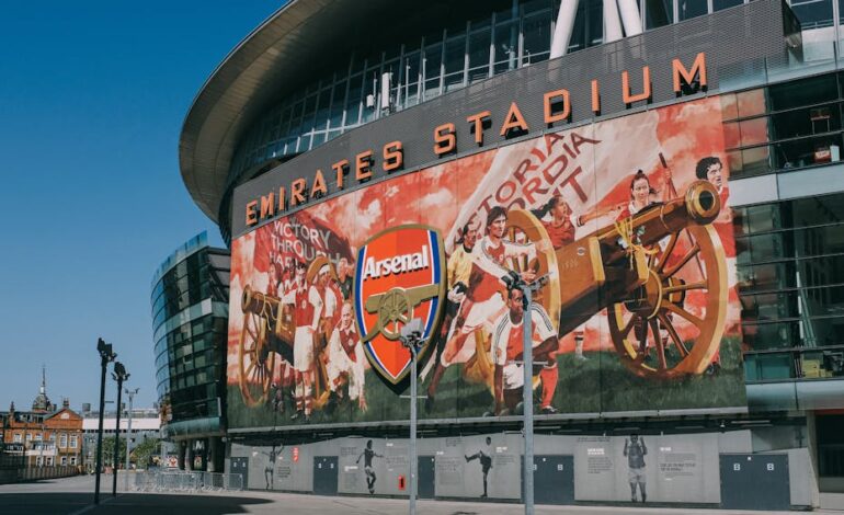 Exterior view of the iconic Emirates Stadium, home of Arsenal FC in London, England.