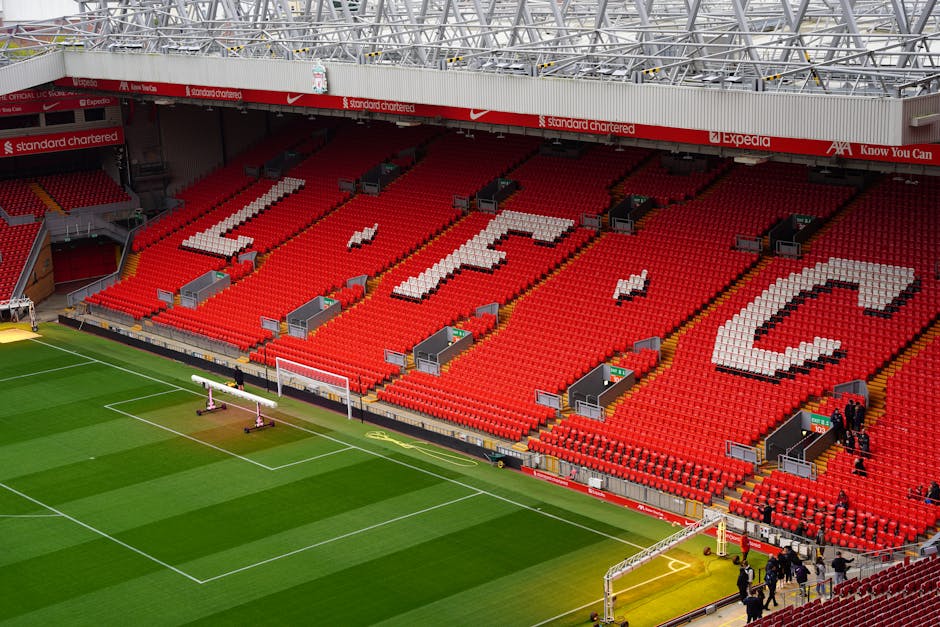 View of Anfield Stadium seating with prominent LFC letters. Perfect capture of iconic Liverpool FC venue.