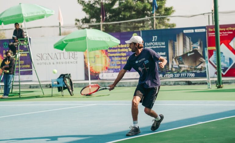 Tennis player in motion during a match on a sunny day in Islamabad. Perfect for sports and lifestyle themes.