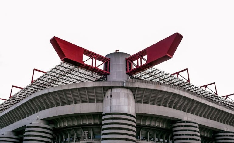 Close-up view of the iconic San Siro Stadium in Milan, showcasing its unique architecture.