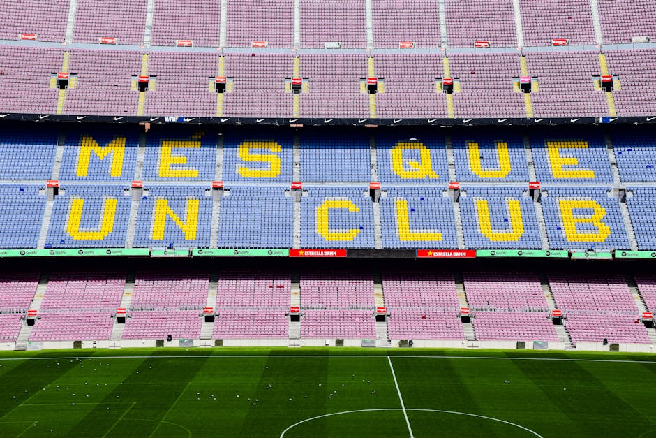 The iconic "Mes Que Un Club" slogan displayed at the Camp Nou stadium in Barcelona, Spain.