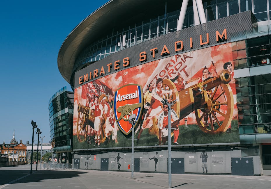 Exterior view of the iconic Emirates Stadium, home of Arsenal FC in London, England.