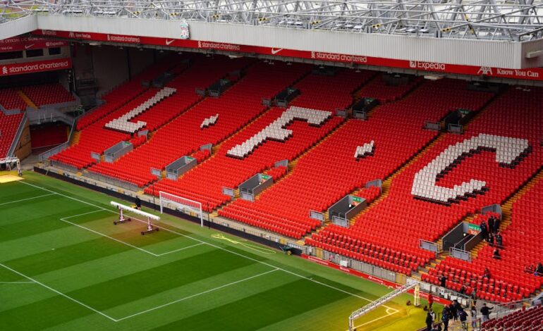 View of Anfield Stadium seating with prominent LFC letters. Perfect capture of iconic Liverpool FC venue.
