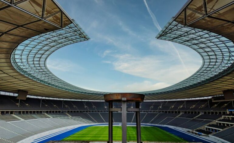 Interior view of the Olympic Stadium in Berlin, showcasing its impressive architecture.